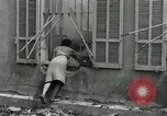 Image of French people dig in rubble Aix-en-Provence France, 1944, second 4 stock footage video 65675022698