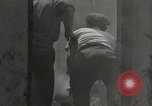 Image of French people dig in rubble Aix-en-Provence France, 1944, second 24 stock footage video 65675022698