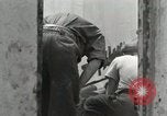Image of French people dig in rubble Aix-en-Provence France, 1944, second 33 stock footage video 65675022698