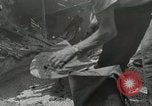 Image of French people dig in rubble Aix-en-Provence France, 1944, second 34 stock footage video 65675022698
