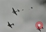 Image of 187th Regimental Combat Team parachutes onto field  Korea, 1951, second 11 stock footage video 65675022702