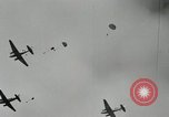 Image of 187th Regimental Combat Team parachutes onto field  Korea, 1951, second 12 stock footage video 65675022702