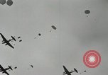 Image of 187th Regimental Combat Team parachutes onto field  Korea, 1951, second 13 stock footage video 65675022702