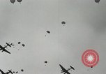 Image of 187th Regimental Combat Team parachutes onto field  Korea, 1951, second 14 stock footage video 65675022702