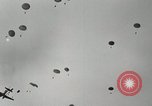 Image of 187th Regimental Combat Team parachutes onto field  Korea, 1951, second 16 stock footage video 65675022702