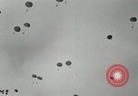 Image of 187th Regimental Combat Team parachutes onto field  Korea, 1951, second 17 stock footage video 65675022702