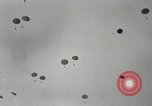 Image of 187th Regimental Combat Team parachutes onto field  Korea, 1951, second 18 stock footage video 65675022702