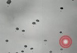 Image of 187th Regimental Combat Team parachutes onto field  Korea, 1951, second 20 stock footage video 65675022702