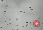 Image of 187th Regimental Combat Team parachutes onto field  Korea, 1951, second 24 stock footage video 65675022702