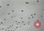 Image of 187th Regimental Combat Team parachutes onto field  Korea, 1951, second 26 stock footage video 65675022702