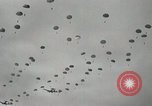 Image of 187th Regimental Combat Team parachutes onto field  Korea, 1951, second 27 stock footage video 65675022702