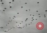 Image of 187th Regimental Combat Team parachutes onto field  Korea, 1951, second 28 stock footage video 65675022702