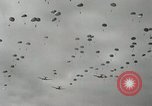 Image of 187th Regimental Combat Team parachutes onto field  Korea, 1951, second 30 stock footage video 65675022702
