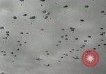 Image of 187th Regimental Combat Team parachutes onto field  Korea, 1951, second 31 stock footage video 65675022702