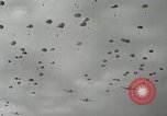 Image of 187th Regimental Combat Team parachutes onto field  Korea, 1951, second 32 stock footage video 65675022702