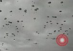 Image of 187th Regimental Combat Team parachutes onto field  Korea, 1951, second 33 stock footage video 65675022702