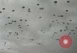 Image of 187th Regimental Combat Team parachutes onto field  Korea, 1951, second 34 stock footage video 65675022702