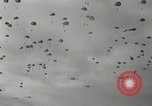Image of 187th Regimental Combat Team parachutes onto field  Korea, 1951, second 35 stock footage video 65675022702