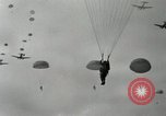Image of 187th Regimental Combat Team parachutes onto field  Korea, 1951, second 36 stock footage video 65675022702