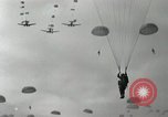 Image of 187th Regimental Combat Team parachutes onto field  Korea, 1951, second 37 stock footage video 65675022702