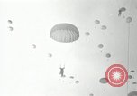 Image of 187th Regimental Combat Team parachutes onto field  Korea, 1951, second 40 stock footage video 65675022702