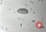 Image of 187th Regimental Combat Team parachutes onto field  Korea, 1951, second 41 stock footage video 65675022702