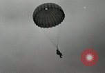 Image of 187th Regimental Combat Team parachutes onto field  Korea, 1951, second 42 stock footage video 65675022702