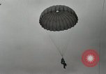 Image of 187th Regimental Combat Team parachutes onto field  Korea, 1951, second 43 stock footage video 65675022702