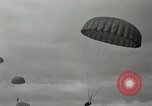 Image of 187th Regimental Combat Team parachutes onto field  Korea, 1951, second 45 stock footage video 65675022702