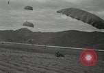 Image of 187th Regimental Combat Team parachutes onto field  Korea, 1951, second 47 stock footage video 65675022702