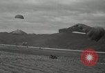 Image of 187th Regimental Combat Team parachutes onto field  Korea, 1951, second 48 stock footage video 65675022702