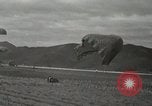 Image of 187th Regimental Combat Team parachutes onto field  Korea, 1951, second 49 stock footage video 65675022702
