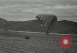 Image of 187th Regimental Combat Team parachutes onto field  Korea, 1951, second 50 stock footage video 65675022702