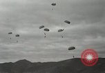 Image of 187th Regimental Combat Team parachutes onto field  Korea, 1951, second 54 stock footage video 65675022702