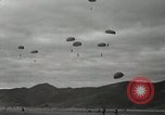 Image of 187th Regimental Combat Team parachutes onto field  Korea, 1951, second 55 stock footage video 65675022702