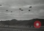 Image of 187th Regimental Combat Team parachutes onto field  Korea, 1951, second 56 stock footage video 65675022702