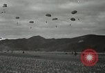 Image of 187th Regimental Combat Team parachutes onto field  Korea, 1951, second 57 stock footage video 65675022702