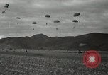 Image of 187th Regimental Combat Team parachutes onto field  Korea, 1951, second 58 stock footage video 65675022702