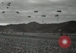 Image of 187th Regimental Combat Team parachutes onto field  Korea, 1951, second 59 stock footage video 65675022702