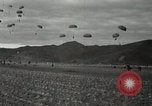 Image of 187th Regimental Combat Team parachutes onto field  Korea, 1951, second 60 stock footage video 65675022702