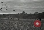 Image of 187th Regimental Combat Team parachutes onto field  Korea, 1951, second 62 stock footage video 65675022702