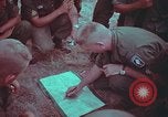 Image of 1st Battalion of 173rd Airborne Brigade Combat Team Vietnam, 1965, second 60 stock footage video 65675022710