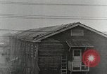 Standbild Tropical Typhoon Japan, 1950, aus Sekunde 32 historischem Filmmaterial Videoclip 65675022719