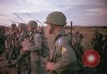 Image of 173rd Airborne Brigade troops Vietnam Bien Hoa Air Base, 1965, second 12 stock footage video 65675022738