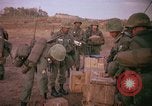 Image of 173rd Airborne Brigade troops Vietnam Bien Hoa Air Base, 1965, second 16 stock footage video 65675022738