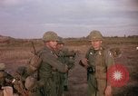 Image of 173rd Airborne Brigade troops Vietnam Bien Hoa Air Base, 1965, second 32 stock footage video 65675022738