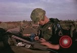Image of 173rd Airborne Brigade troops Vietnam Bien Hoa Air Base, 1965, second 9 stock footage video 65675022739