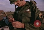 Image of 173rd Airborne Brigade troops Vietnam Bien Hoa Air Base, 1965, second 13 stock footage video 65675022739