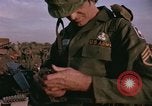 Image of 173rd Airborne Brigade troops Vietnam Bien Hoa Air Base, 1965, second 17 stock footage video 65675022739