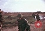 Image of 173rd Airborne Brigade troops Vietnam Bien Hoa Air Base, 1965, second 46 stock footage video 65675022739